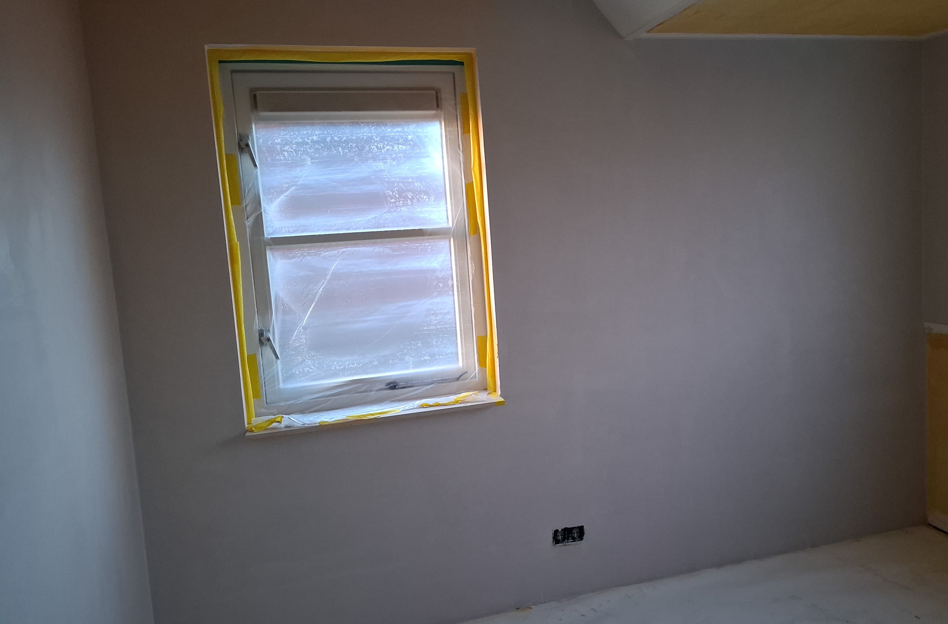 Stucwerk woonkamer — gladde wanden en plafond